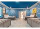 Toy Story themed bedroom with three twin beds and blue cloud walls at 4562 Narrative Ln, Kissimmee, FL 34746