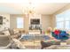 Modern living room with stylish furniture and geometric wall art at 4562 Narrative Ln, Kissimmee, FL 34746