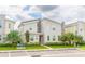 Modern two-story home with landscaping at 4562 Narrative Ln, Kissimmee, FL 34746