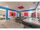 Fun game room with Marvel theme, air hockey, and arcade game at 4562 Narrative Ln, Kissimmee, FL 34746