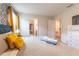 King-size bed, stylish decor, and access to bathroom at 4562 Narrative Ln, Kissimmee, FL 34746