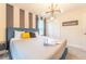 King-size bed, stylish decor, and ample closet space at 4562 Narrative Ln, Kissimmee, FL 34746