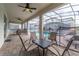 Relaxing patio with seating area and view of the pool at 4562 Narrative Ln, Kissimmee, FL 34746