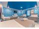 Toy Story themed bedroom with three twin beds and blue cloud walls at 4562 Narrative Ln, Kissimmee, FL 34746