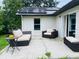 Relaxing patio area with wicker furniture, perfect for outdoor enjoyment at 1393 Beverly Ln, Casselberry, FL 32707