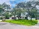 Attractive single story home nestled amongst lush landscaping and mature trees at 1393 Beverly Ln, Casselberry, FL 32707