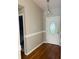 Inviting entryway with hardwood floors and neutral wall colors at 1393 Beverly Ln, Casselberry, FL 32707