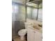 Bathroom featuring a shower, toilet, vanity with sink, and mirror at 1393 Beverly Ln, Casselberry, FL 32707