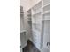 Large walk-in closet with ample shelving and drawers at 555 Sanctuary Golf Pl, Apopka, FL 32712