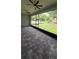 Covered lanai with paver flooring and ceiling fans at 555 Sanctuary Golf Pl, Apopka, FL 32712