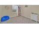 Playroom with a bookcase, beanbag chair, and storage at 2854 Black Birch Dr, Ocoee, FL 34761