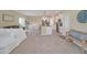 Open kitchen with island, stainless steel appliances, and breakfast bar at 2854 Black Birch Dr, Ocoee, FL 34761