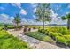 Community patio with seating and lake view at 2854 Black Birch Dr, Ocoee, FL 34761
