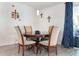 Dining area with round table and four chairs at 550 Saint Johns Rd, Tavares, FL 32778