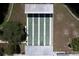 Aerial view of multiple shuffleboard courts with covered seating at 550 Saint Johns Rd, Tavares, FL 32778