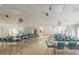 Spacious community room with tables and chairs for gatherings at 550 Saint Johns Rd, Tavares, FL 32778