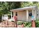 Community clubhouse with a porch and nautical theme at 550 Saint Johns Rd, Tavares, FL 32778