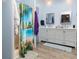 Updated bathroom with double vanity and shower at 550 Saint Johns Rd, Tavares, FL 32778
