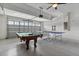 Finished garage with pool table and ping pong table at 8903 Stinger Dr, Davenport, FL 33896