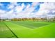 Two well-maintained tennis courts with surrounding fencing at 8903 Stinger Dr, Davenport, FL 33896