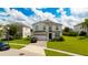 Two story home with a two car garage at 8903 Stinger Dr, Davenport, FL 33896
