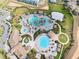 Large community pool complex with water features and lounge areas at 8903 Stinger Dr, Davenport, FL 33896