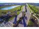 Gated community entrance with landscaping and signage at 8903 Stinger Dr, Davenport, FL 33896