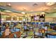 Community clubhouse restaurant with a full bar and seating at 8903 Stinger Dr, Davenport, FL 33896