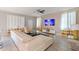 Living room features a large sectional sofa and a flat screen TV at 8903 Stinger Dr, Davenport, FL 33896