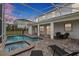 Enjoy this private pool and spa at night at 8903 Stinger Dr, Davenport, FL 33896