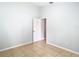 Empty bedroom with tile floors and a door at 428 Short Pine Cir, Orlando, FL 32807