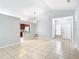 Bright living room with tile floors and vaulted ceilings at 428 Short Pine Cir, Orlando, FL 32807