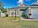 Inviting front yard with a paved walkway leading to the front door at 428 Short Pine Cir, Orlando, FL 32807
