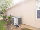 Exterior shot of the central AC unit at 4725 Cumbrian Lakes Dr, Kissimmee, FL 34746