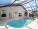 Inviting pool area with screened enclosure at 4725 Cumbrian Lakes Dr, Kissimmee, FL 34746