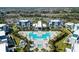 Aerial view of community with multiple buildings and pools at 7740 Sandy Ridge Dr # 234, Reunion, FL 34747