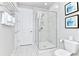 Clean bathroom with shower, toilet and updated flooring at 7740 Sandy Ridge Dr # 234, Reunion, FL 34747