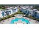 Luxury community pool and surrounding villas at 7740 Sandy Ridge Dr # 234, Reunion, FL 34747