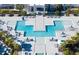 Resort-style pool with spacious deck and lounge chairs at 7740 Sandy Ridge Dr # 234, Reunion, FL 34747