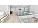 Loft area overlooking the living room with a pool table at 7740 Sandy Ridge Dr # 234, Reunion, FL 34747