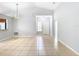 Bright living room with tile floors and vaulted ceilings at 428 Short Pine Cir, Orlando, FL 32807