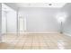 Bright and airy living room with tile floors at 428 Short Pine Cir, Orlando, FL 32807