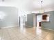 Modern kitchen with granite countertops and stainless steel appliances at 428 Short Pine Cir, Orlando, FL 32807