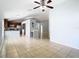 Spacious living room with tile flooring and sliding glass doors at 428 Short Pine Cir, Orlando, FL 32807