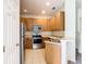 Modern kitchen with stainless steel appliances and ample cabinetry at 2543 Old Kent Cir, Kissimmee, FL 34758
