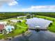 Aerial view of community pool and lake access at 2543 Old Kent Cir, Kissimmee, FL 34758