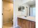 Small bathroom with toilet and vanity at 2543 Old Kent Cir, Kissimmee, FL 34758