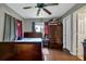 Spacious bedroom with double bed and wood flooring at 1759 Tallo Way, Orlando, FL 32818