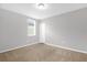 Spacious bedroom with neutral walls and carpet at 531 Tortugas St, Haines City, FL 33844