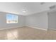 Spacious living room with neutral walls and tile flooring at 531 Tortugas St, Haines City, FL 33844